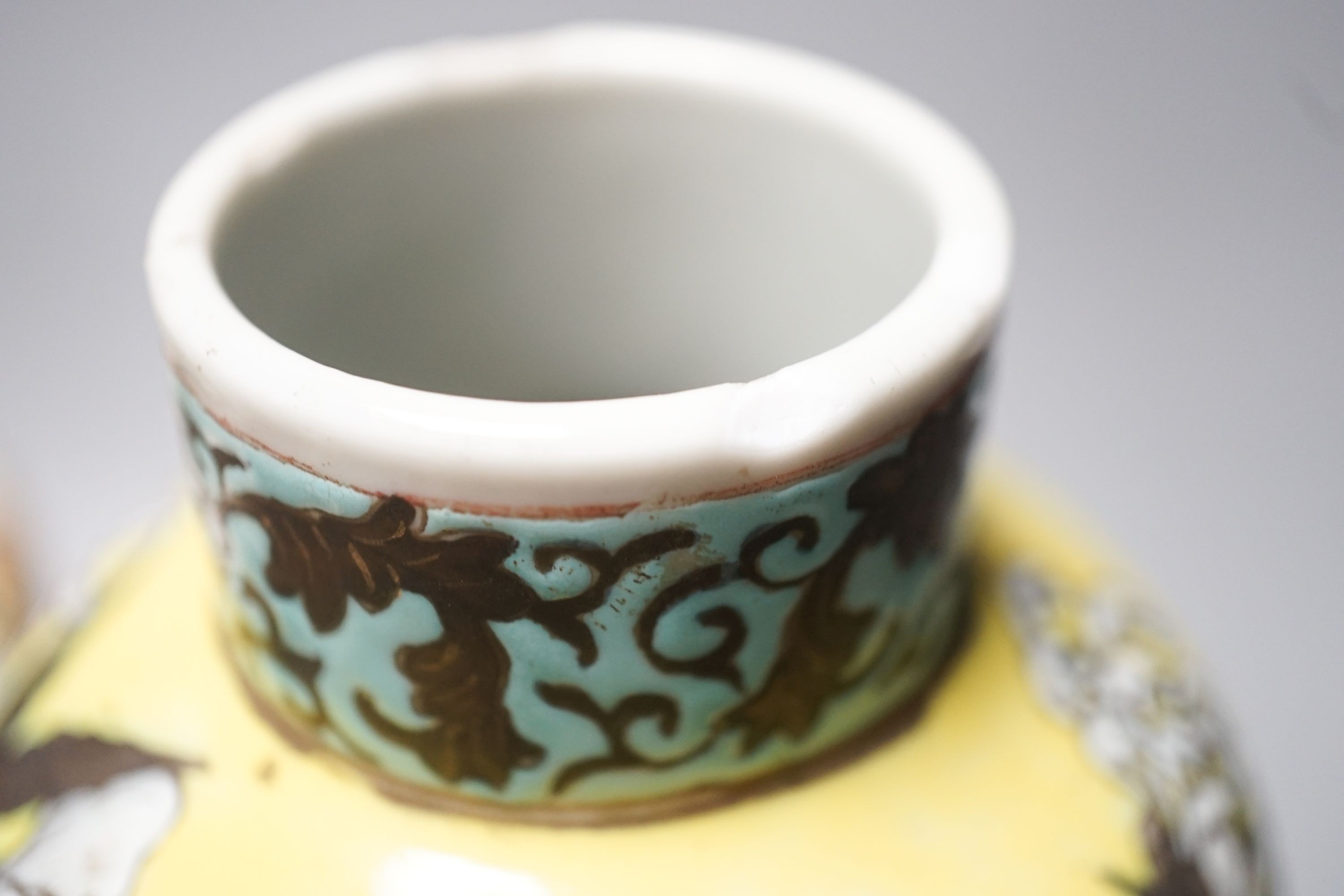 A 19th century Chinese famille rose teapot, sugar bowl, saucer dish vase and a similar yellow ground ‘dragon’ vase and cover 21cm